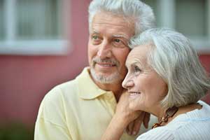 Happy couple who just rolled over their 401k into an annuity