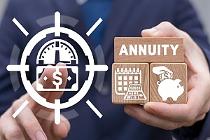 a man holding wooden blocks with a calendar piggy bank and annuity symbols