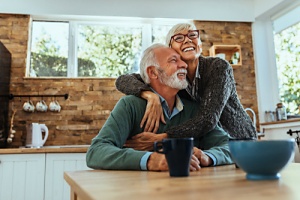 couple hugging happily