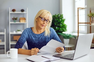 woman looking at computer